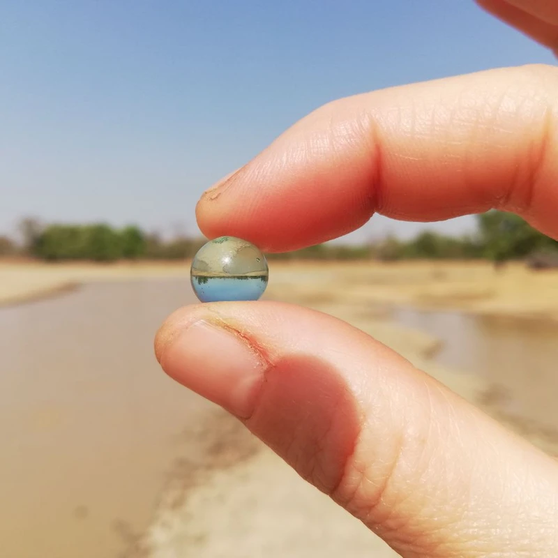 Actviated glass ball to go into river pulsing the water with more life and energy